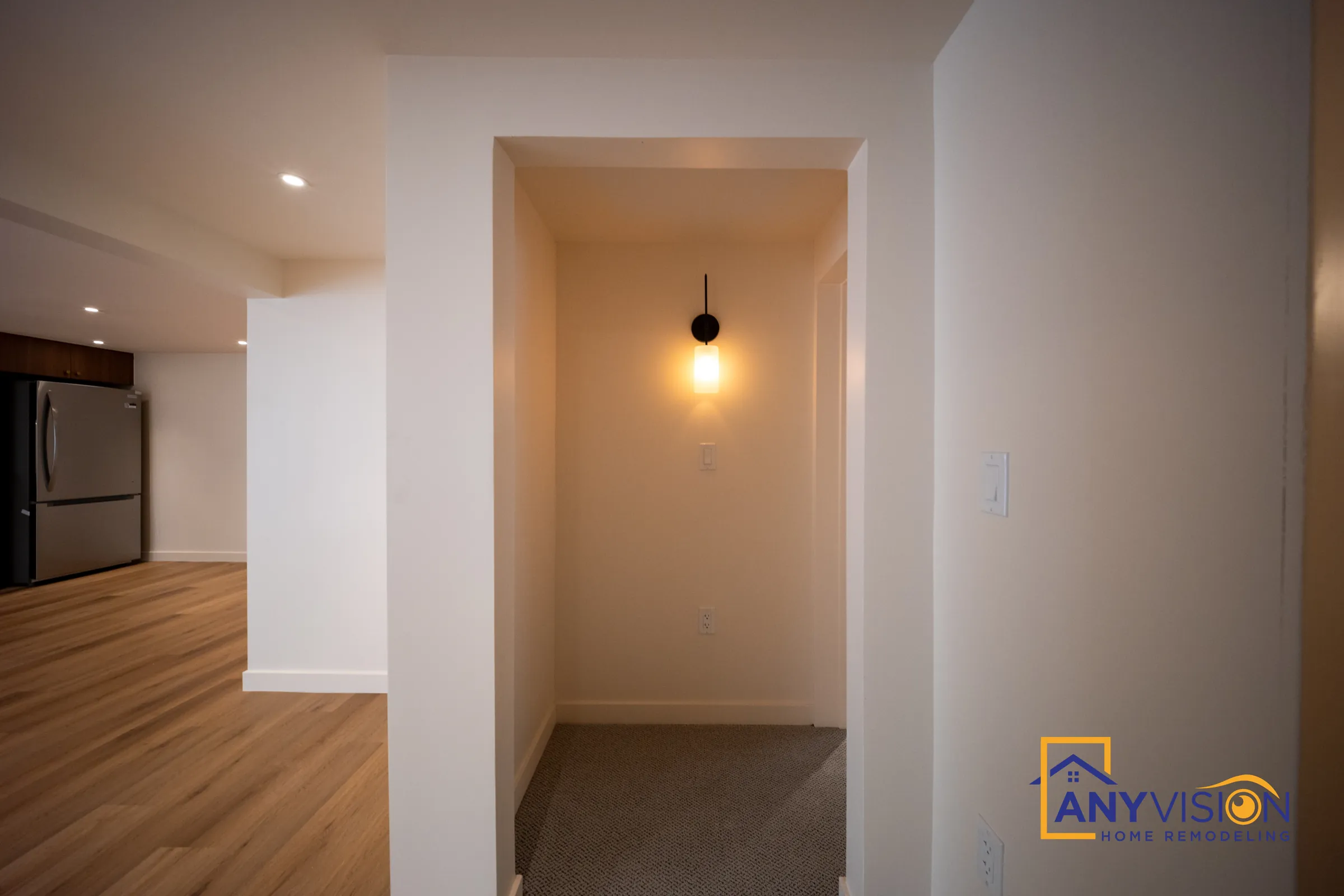 Entry nook with a pendant light off the open living area