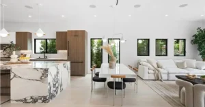 Open-concept living room and kitchen with marble island, wood cabinets, and modern dining area designed by basement contractor.